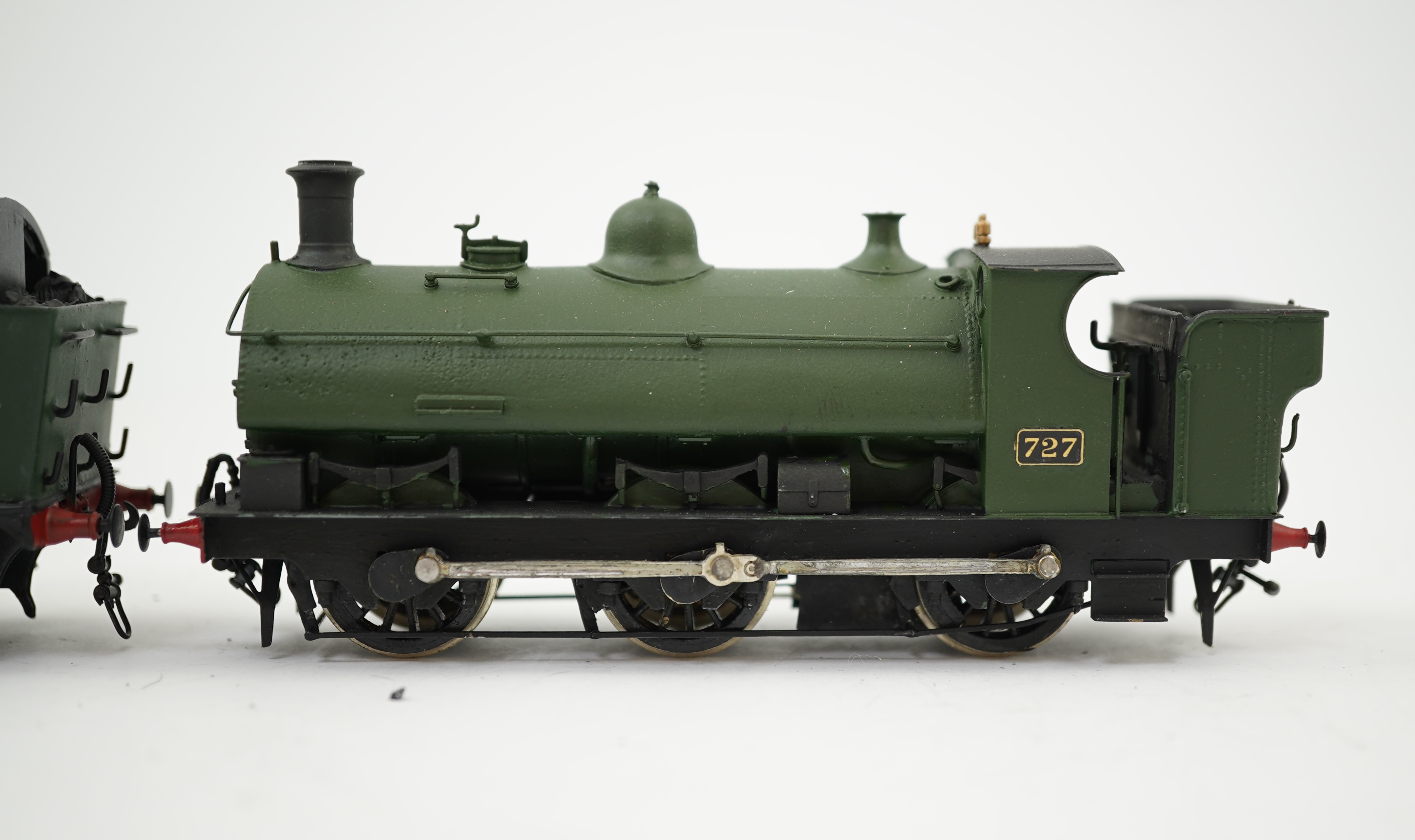 Three 00 gauge brass and white metal kit built GWR saddle tank locomotives; a 1361 class 0-6-0ST, 1362, together with an 850 class 0-6-0ST, 851, and a 727 class 0-6-0ST, 727, constructed, painted and lined to a high stan